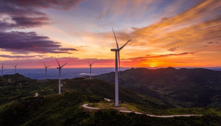 Windmills on mountains with sunset - RA-ESG